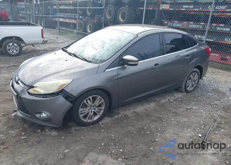 2012 Ford Focus Sel z USA, uszkodzony, nr VIN 1FAHP3H20CL168087